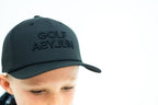 Junior in a black Off Script cap, close up