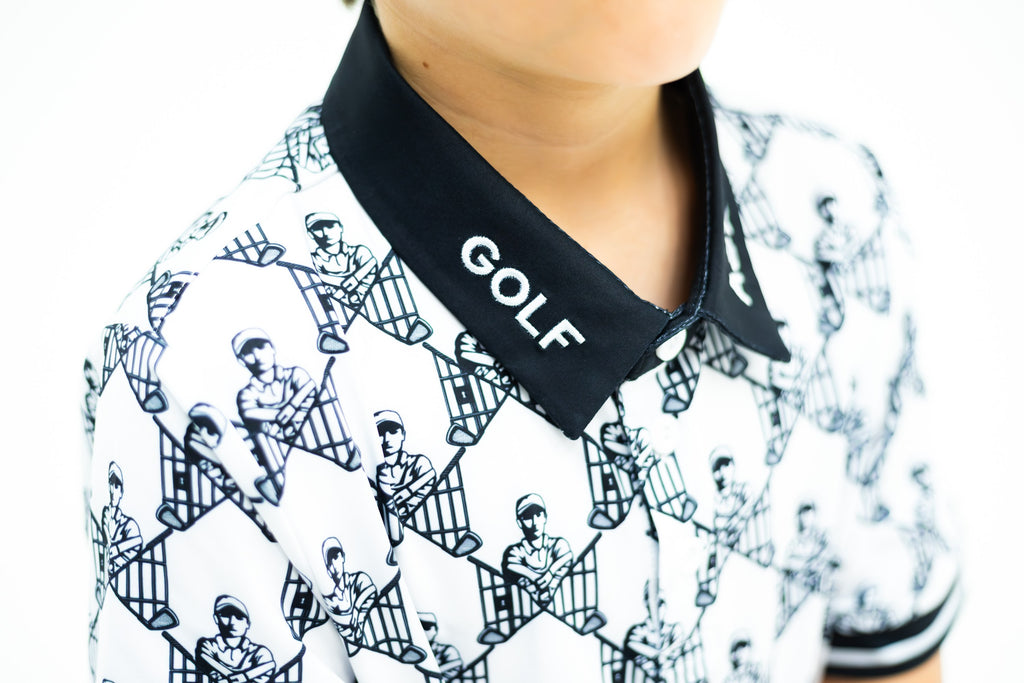 Collar of the white and black Escape Artist polo