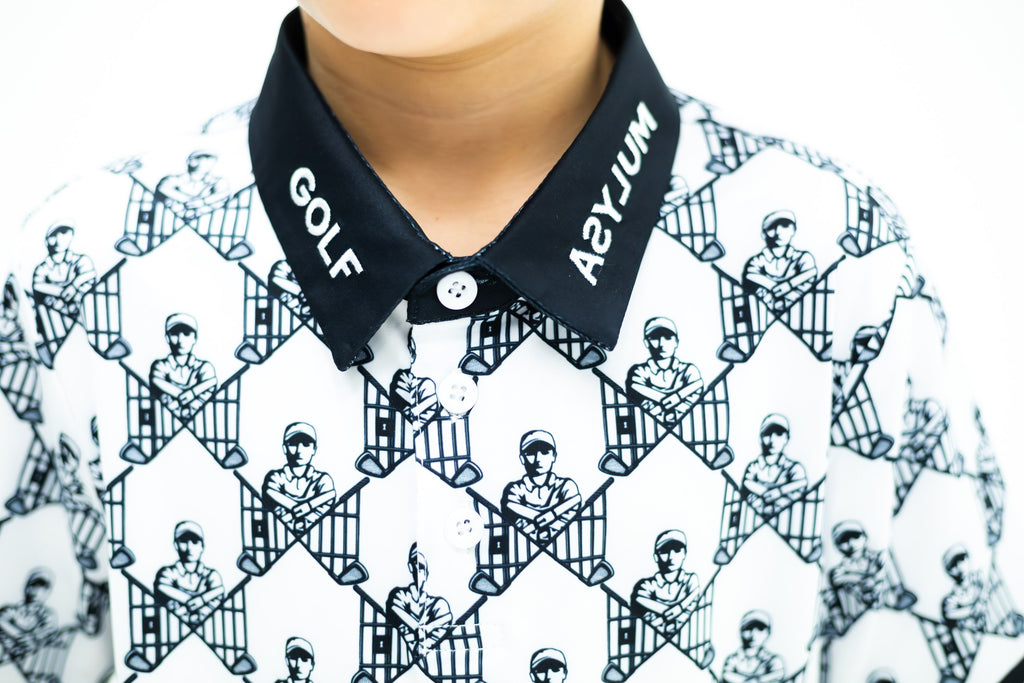 Collar and placket of the white and black Escape Artist polo