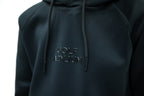 Embossed Golf Asylum logo on the black hoodie